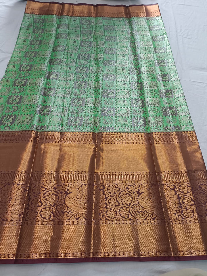 Tathastu Mint Green &amp; Copper Zari Printed Saree