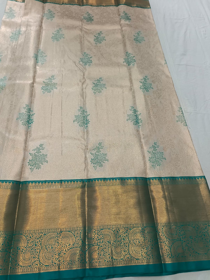 Tathastu Cream &amp; Teal Blue Floral Zari Border Saree